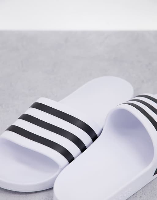 Adidas Training Adilette Sliders In White And Black