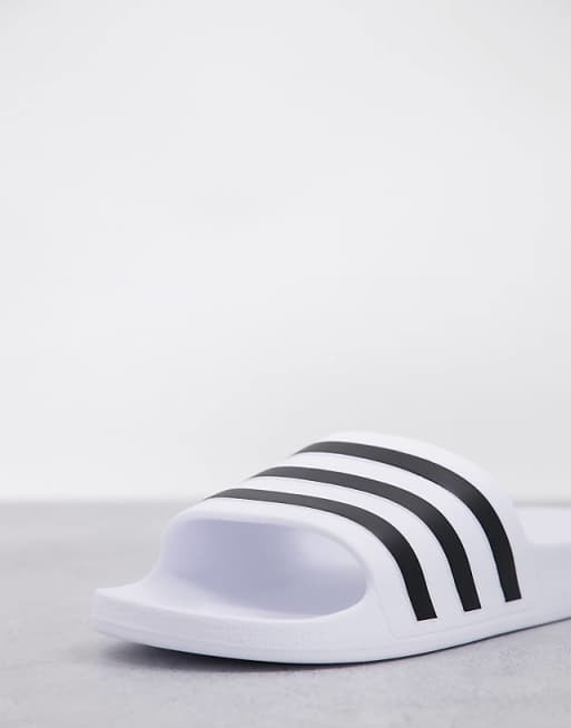 Adidas Training Adilette Sliders In White And Black
