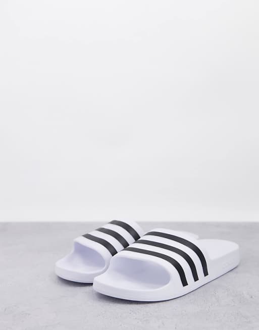 adidas training Adilette sliders in white and black