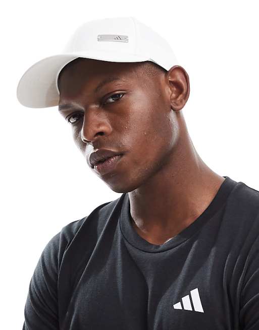 adidas Training baseball cap with metal tab in white