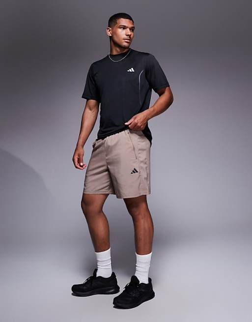adidas Training essentials woven shorts in chalky brown