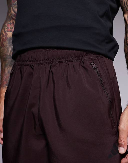 Adidas Training Essentials Woven Shorts In Dark Brown