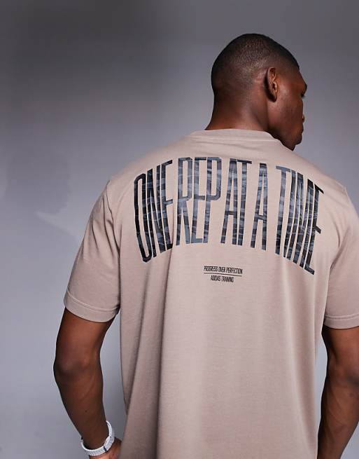 adidas Training t-shirt with graphic print in chalky brown