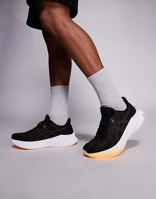 Asics Dynablast 5 running trainers in black and brown stone