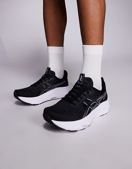 Asics Gel-Kayano 32 running trainers in black and white