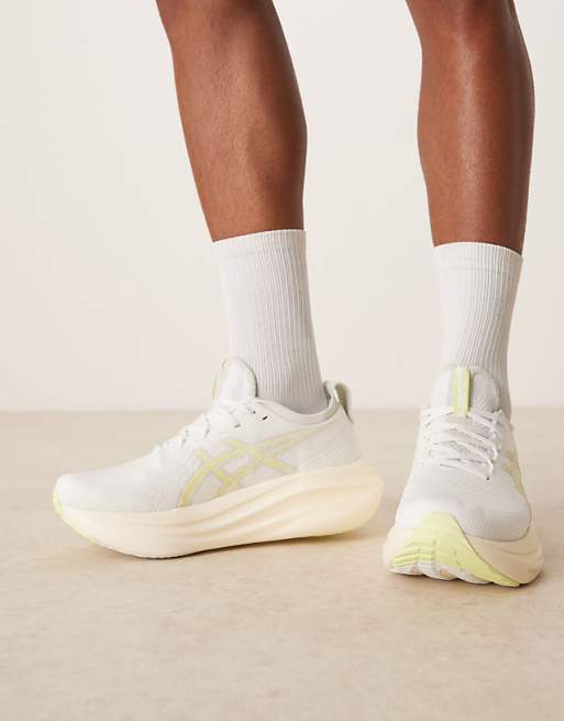 Asics Gel-Nimbus 27 running trainers in white and huddle yellow