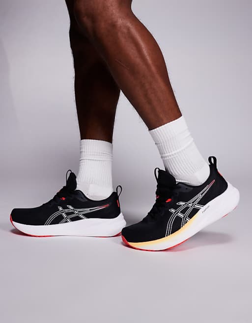 Asics Gel-Pulse 16 running trainers in black and white