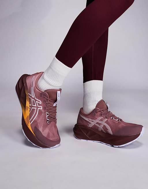 Asics Novablast 5 Tr running trainers in red