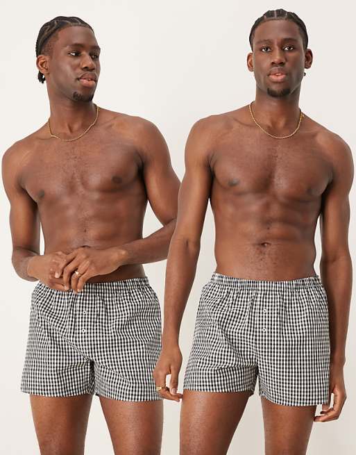 ASOS DESIGN 2 pack woven boxers in navy and black gingham