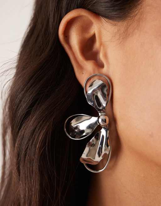 ASOS DESIGN Asymetric Stud Earrings With Textured Metal Half-flower Design In Silver Tone