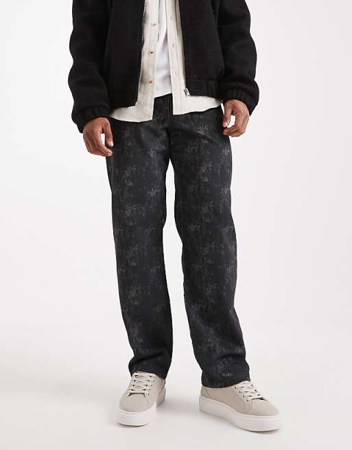 ASOS DESIGN baggy jeans in black with print