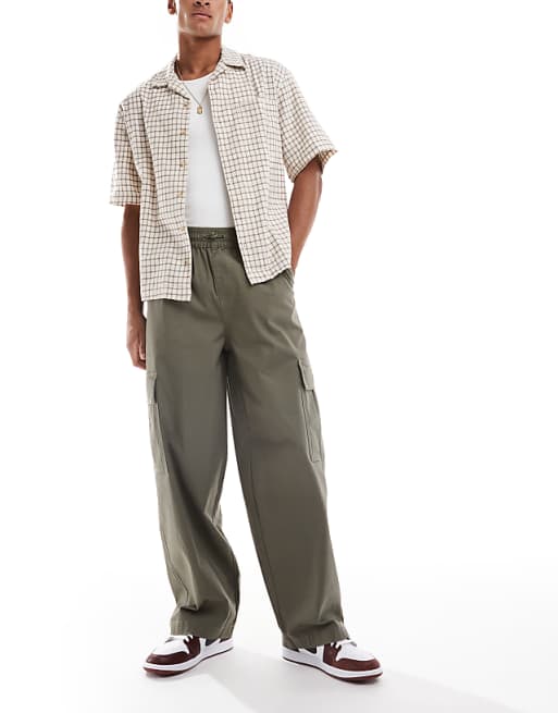 ASOS DESIGN baggy pull on cargo trousers in khaki