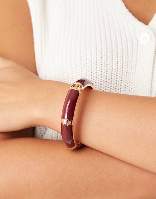 ASOS DESIGN bangle with burgundy enamel in gold tone