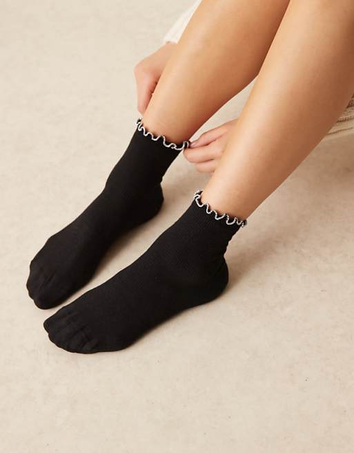 ASOS DESIGN black socks with silver glitter frill