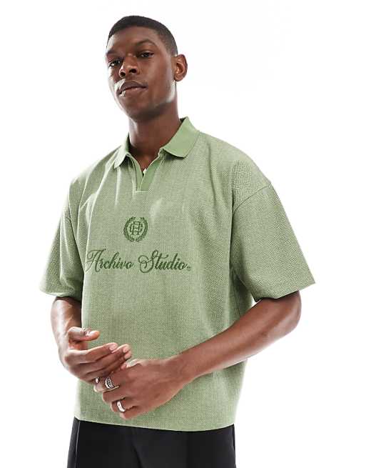 ASOS DESIGN boxy oversized polo with chest embroidery in green chevron fabric