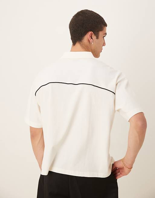 ASOS DESIGN Boxy Oversized Polo With Text Graphic In Cream