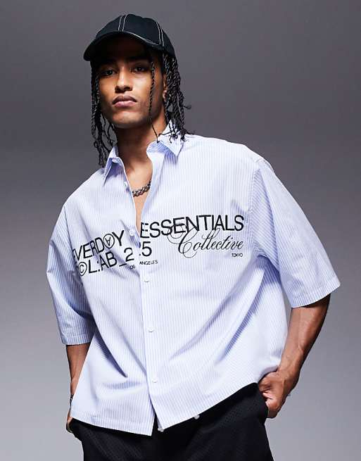 ASOS DESIGN boxy oversized poplin shirt with graphic in navy
