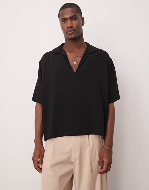 ASOS DESIGN boxy oversized shirt with deep v neck in black