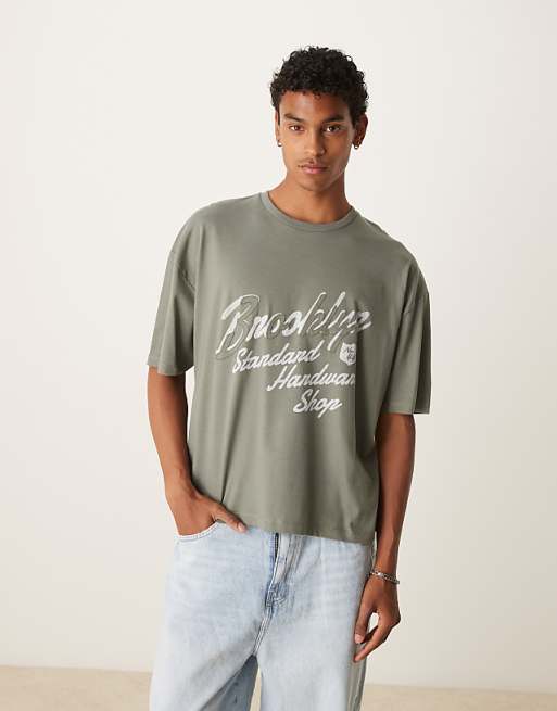 ASOS DESIGN boxy oversized t-shirt with city applique in khaki