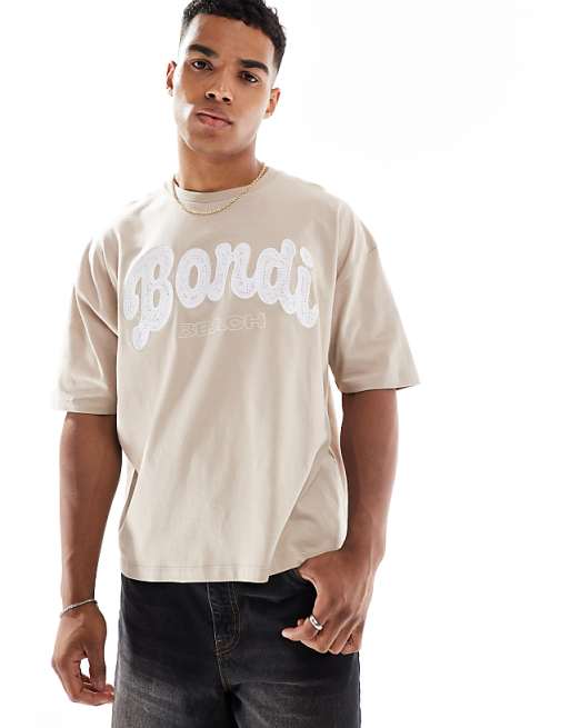 ASOS DESIGN boxy oversized t-shirt with city embroidery in washed beige