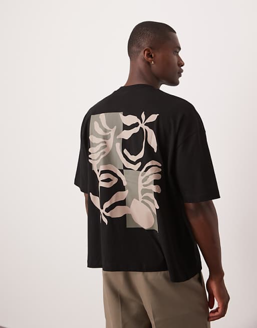 ASOS DESIGN boxy oversized t-shirt with floral graphic in black ASOS DESIGN boxy oversized t-shirt with floral graphic in black