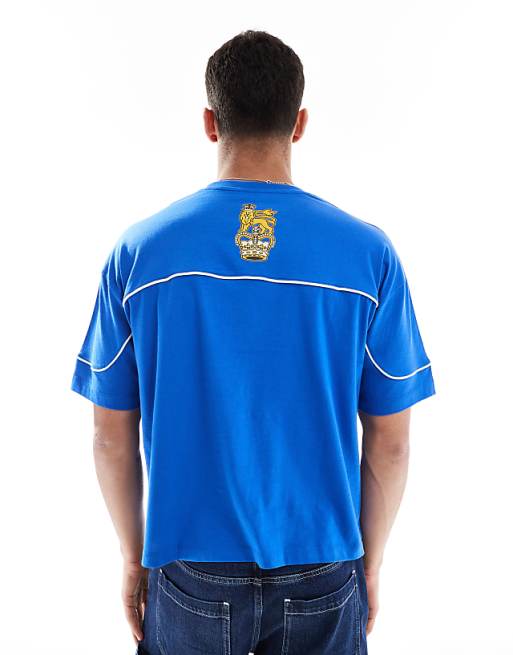 ASOS DESIGN Boxy Oversized T-shirt With Sports Graphic In Blue