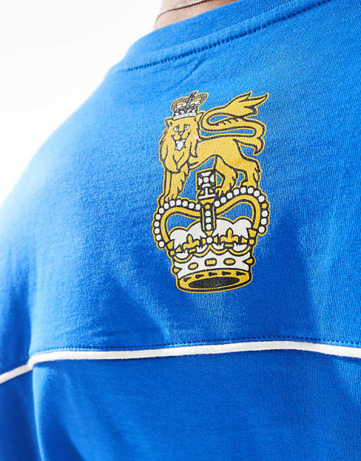 ASOS DESIGN Boxy Oversized T-shirt With Sports Graphic In Blue