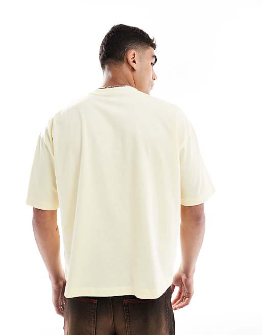 ASOS DESIGN Boxy Oversized T-shirt With Sports Graphic In Heavyweight 240gsm Buttercream