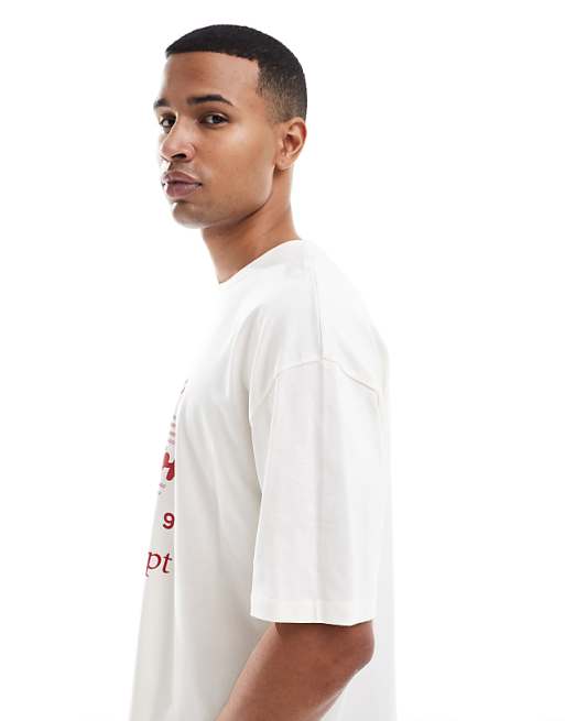 ASOS DESIGN Boxy Oversized T-shirt With Varsity Graphic In Off White