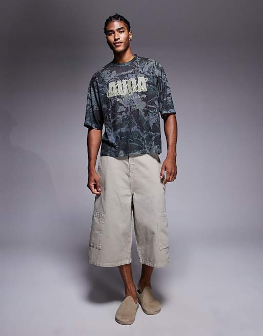 ASOS DESIGN Boxy Relaxed T-shirt With Text Graphic In Camo Print