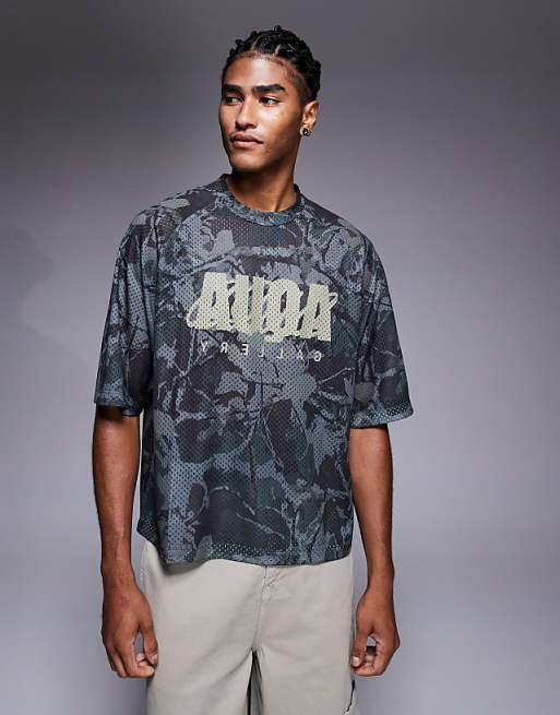 ASOS DESIGN boxy relaxed t-shirt with text graphic in camo print