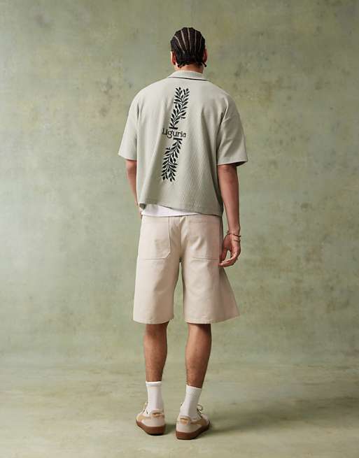 ASOS DESIGN boxy short sleeve polo with embroidery in green