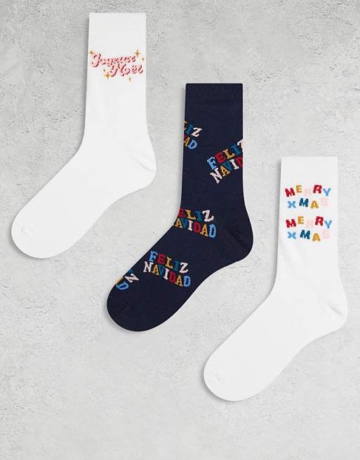 ASOS DESIGN Christmas 3 pack socks with Feliz Navidad graphic in multi