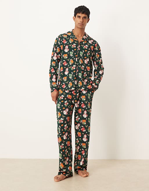 ASOS DESIGN Christmas pyjama set with characters graphic in green