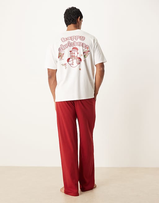 ASOS DESIGN Christmas pyjama set with characters graphic in red