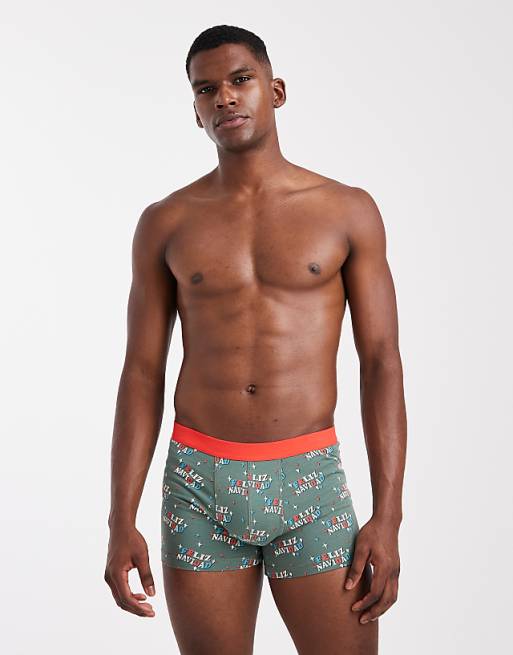 ASOS DESIGN Christmas trunks with Feliz Navidad graphic in green