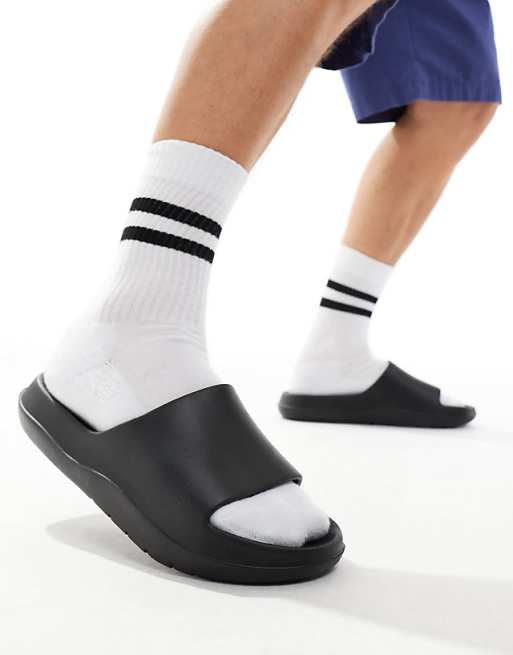 ASOS DESIGN chunky sliders in black