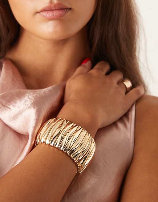 ASOS DESIGN chunky stretch bracelet in gold tone