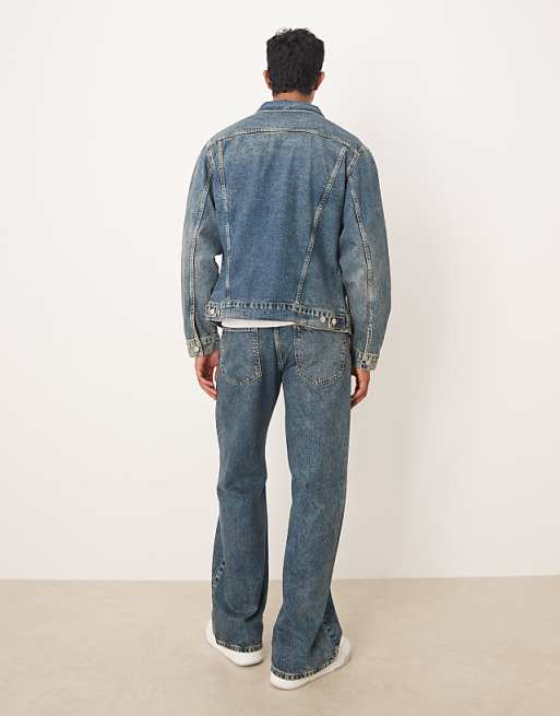 ASOS DESIGN Co-ord Wide Flare Jeans In Mid Wash Blue With Yellow Tint