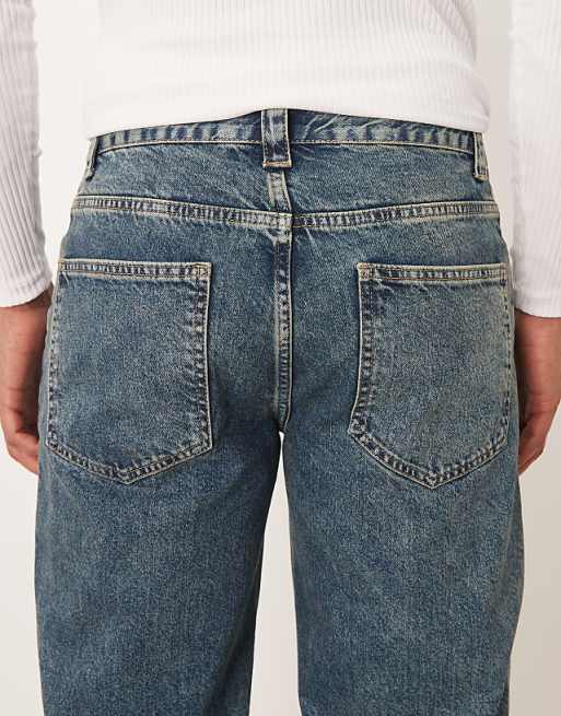 ASOS DESIGN Co-ord Wide Flare Jeans In Mid Wash Blue With Yellow Tint