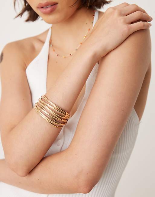 ASOS DESIGN cuff bracelet with wire design in gold tone