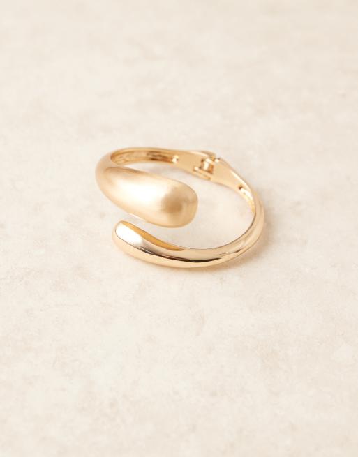 ASOS DESIGN Cuff Bracelet With Wrap Around Molten Detail With Shiny And Brushed Gold Tone