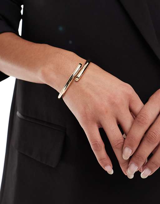 ASOS DESIGN cuff bracelet with wrap detail in gold tone