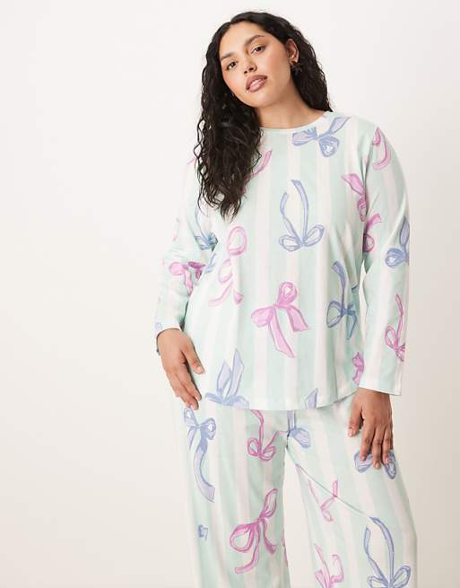 ASOS DESIGN Curve Christmas bow long sleeve top & trouser pyjama set in blue stripe