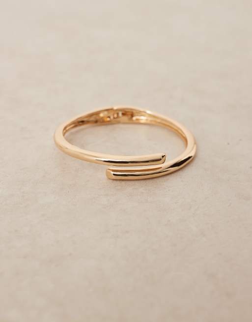 ASOS DESIGN Curve Cuff Bracelet With Wrap Detail In Gold Tone