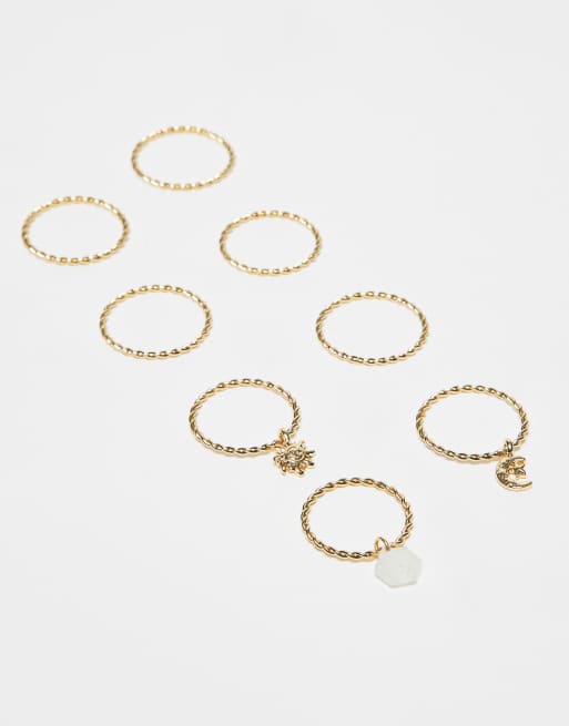 ASOS DESIGN Curve Multi-pack Of Rings With Pendant Charms Detail In Gold Tone