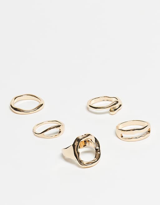 ASOS DESIGN Curve multi-pack of rings with sculptural molten design in gold tone