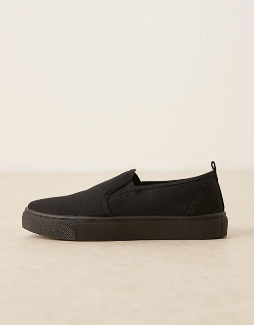 ASOS DESIGN Dotty Slip On Plimsolls In Black
