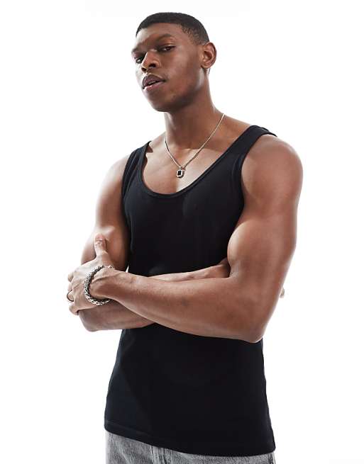 ASOS DESIGN Essentials muscle fit vest in black rib
