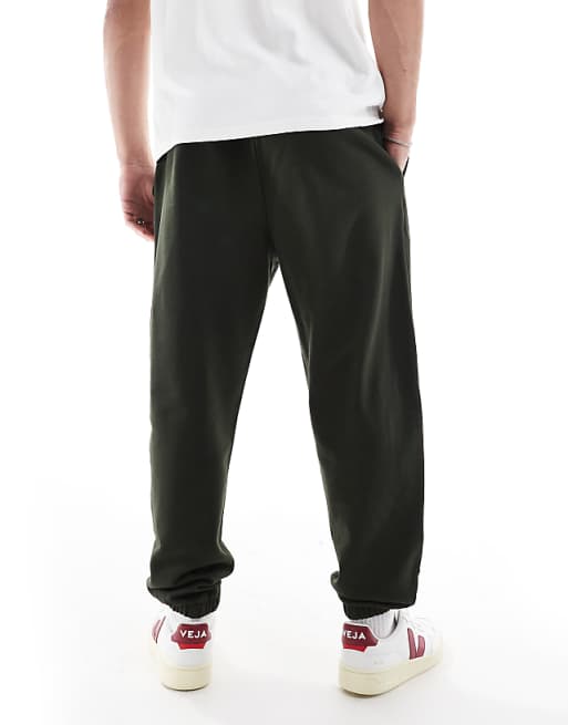 ASOS DESIGN Essentials Tapered Joggers In Dark Green